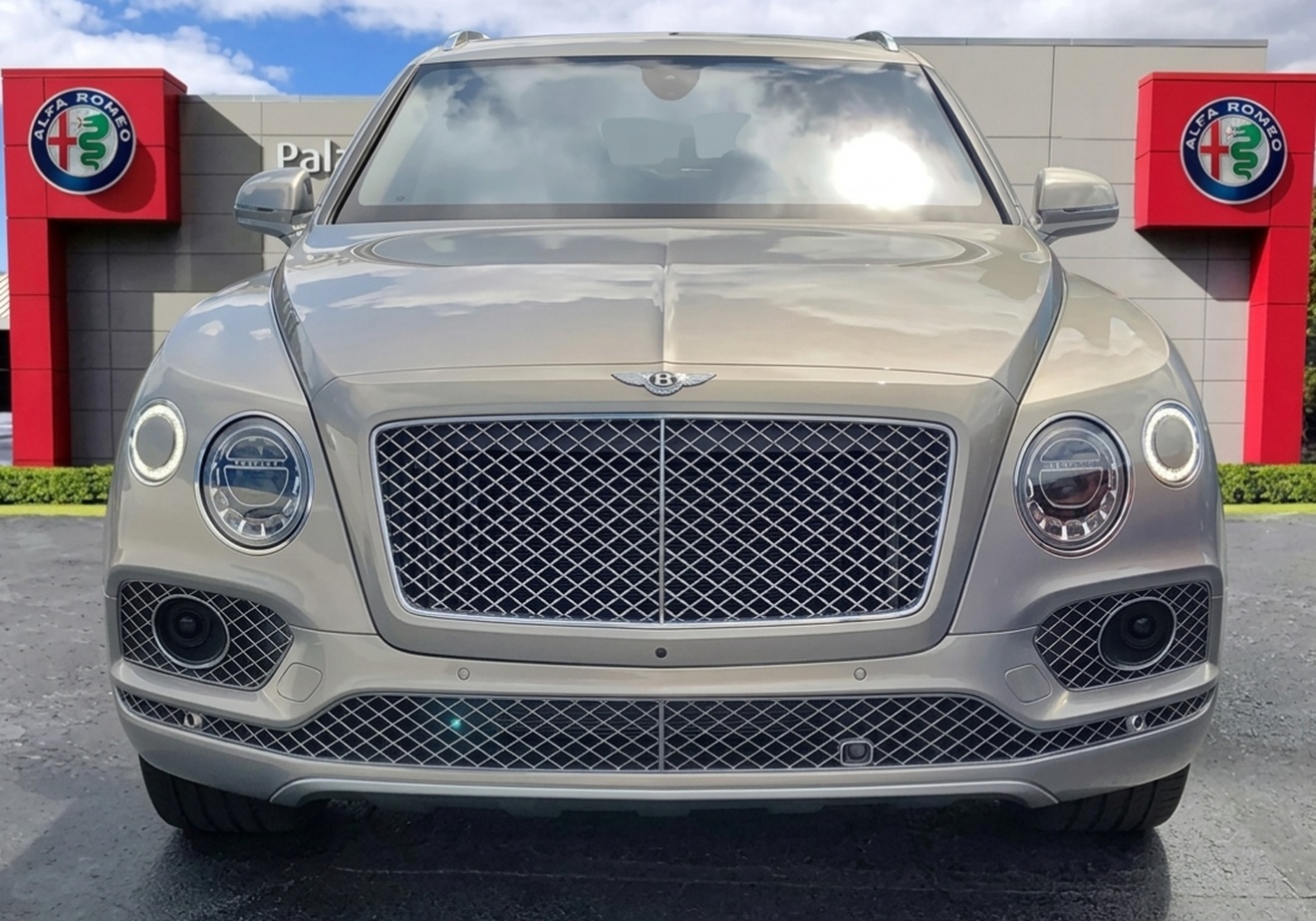 2017 Bentley Bentayga Front: Top options within the Bentley vs Rolls-Royce comparison. Available right now at Palmetto Alfa Romeo-FIAT, Miami.