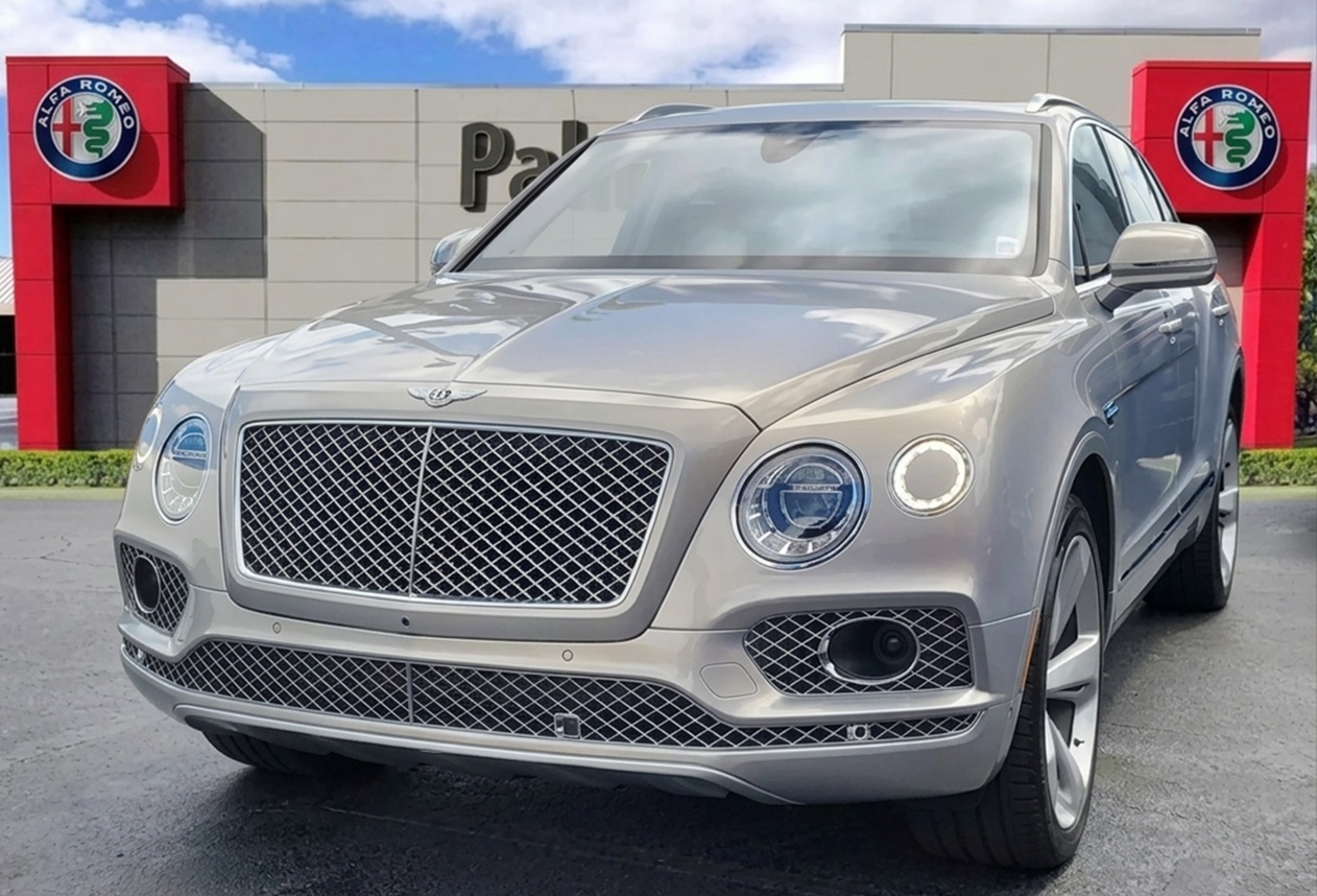 2017 Bentley Bentayga: Top options within the Bentley vs Rolls-Royce comparison. Available right now at Palmetto Alfa Romeo-FIAT, Miami.
